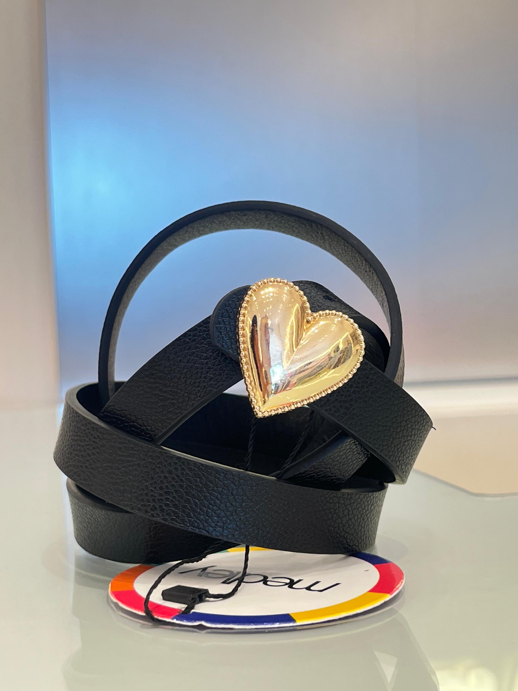 gold heart-shaped belt